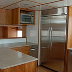 Large Kitchen Area with Fridge on Boat